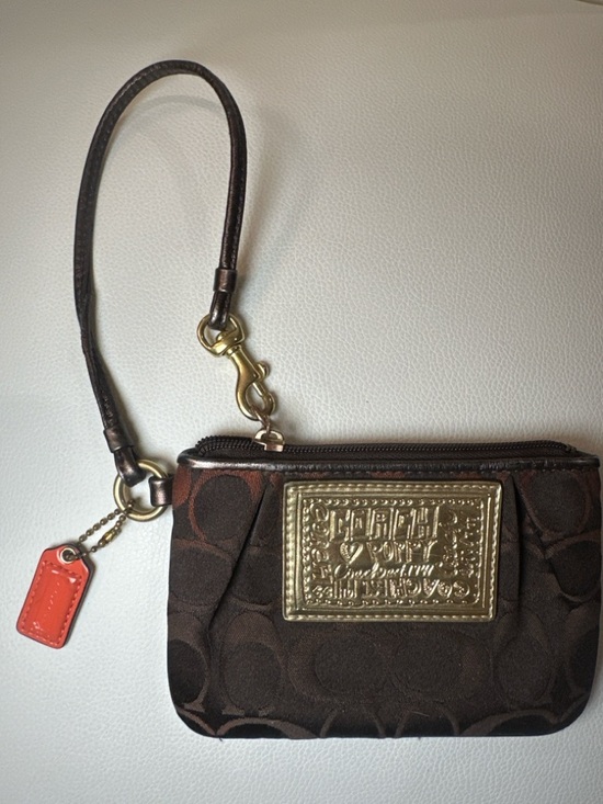 Coach Handbags - Coach Brown Poppy Signature
Wristlet with Gold Plaque w/ Original Hang Tag GUC